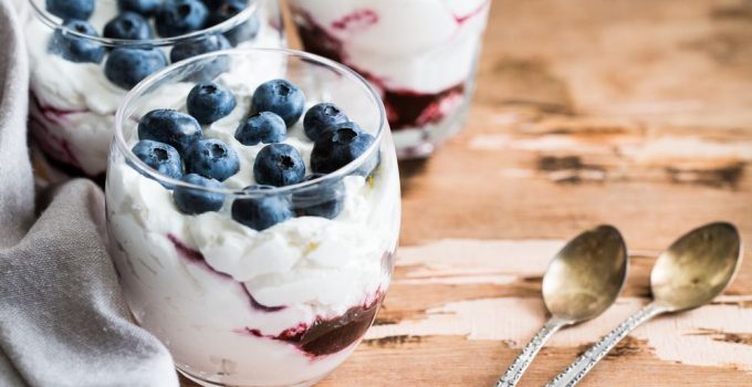A Parfait with blueberry sauce for low carb diets that is healthy