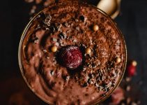 Low carb dessert that's chocolaty and in a cup garnished with chocolate pieces - sugar free.